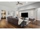 Spacious living room featuring modern decor, sleek furniture, and an open-concept design perfect for entertaining at 803 Brooker Village Cir, Lutz, FL 33548