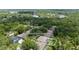 Aerial view of neighborhood property with a private pool and well-maintained landscaping at 8836 Alafia Cove Dr, Riverview, FL 33569