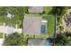 Aerial view of the home highlighting the backyard, pool, and the surrounding area at 8836 Alafia Cove Dr, Riverview, FL 33569