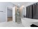 Bathroom featuring a walk-in glass shower and soaking tub at 8836 Alafia Cove Dr, Riverview, FL 33569