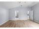 Spacious bedroom with multiple door access points to the other areas of the house at 8836 Alafia Cove Dr, Riverview, FL 33569