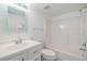 Well-lit bathroom with a shower-tub combo and modern vanity at 900 Cove Cay Dr # 1B, Clearwater, FL 33760