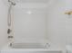Bright bathroom with a jacuzzi-style tub and white tiled shower at 900 Cove Cay Dr # 1B, Clearwater, FL 33760