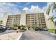 Beautiful view of the well-maintained condo building with parking at 900 Cove Cay Dr # 1B, Clearwater, FL 33760