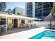 Community pool and lounging area, perfect for relaxing and enjoying the Florida sunshine at 900 Cove Cay Dr # 1B, Clearwater, FL 33760