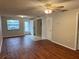 Comfortable living room with a ceiling fan, a front door and closet at 101 Lake Ne Ave # 121, Largo, FL 33771