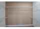 Spacious walk-in closet with wire shelving for ample storage and organization at 10305 Cross River Trl, Parrish, FL 34219