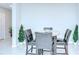 Cozy dining area features a modern table with chairs and decor at 10360 Blue Plume Ct, Riverview, FL 33578