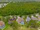 Charming home with pool, nestled in a serene neighborhood near lush wooded areas, offering privacy at 10532 Plantation Bay Dr, Tampa, FL 33647