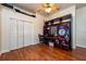 Office space featuring desk, hardwood flooring, and closet at 10532 Plantation Bay Dr, Tampa, FL 33647