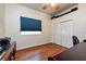 Office space featuring desk, hardwood flooring, and closet at 10532 Plantation Bay Dr, Tampa, FL 33647