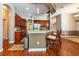 A stylish kitchen featuring granite countertops, stainless steel appliances, and cherry wood cabinetry at 10532 Plantation Bay Dr, Tampa, FL 33647