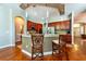 A stylish kitchen featuring granite countertops, stainless steel appliances, and cherry wood cabinetry at 10532 Plantation Bay Dr, Tampa, FL 33647