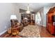 Comfortable living room features hardwood floors, a chandelier and large windows at 10532 Plantation Bay Dr, Tampa, FL 33647