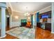 Living room features a bar area with hardwood floors and ample natural light at 10532 Plantation Bay Dr, Tampa, FL 33647