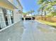 Large back patio with plenty of space for entertaining and fenced in yard at 10924 Summerton Dr, Riverview, FL 33579