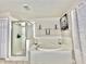 Beautiful bathroom with a tub shower combination and a glass enclosure offering a relaxing bathing experience at 10924 Summerton Dr, Riverview, FL 33579