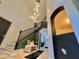 Grand foyer with a modern staircase, stylish lighting, and elegant decor at 10924 Summerton Dr, Riverview, FL 33579