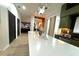 Kitchen island has white countertop and hardwood floors at 10924 Summerton Dr, Riverview, FL 33579