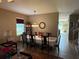 An elegant dining room featuring a large window, a dining table and lots of space at 12231 Fairlawn Dr, Riverview, FL 33579