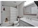 Clean bathroom featuring a shower/tub combo, single vanity, and updated fixtures at 12826 French Market Dr, Riverview, FL 33579