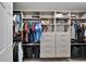 Walk-in closet featuring custom shelving and organizers to maximize storage space at 12826 French Market Dr, Riverview, FL 33579