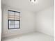 Bright bedroom with a large window allowing lots of natural light at 13299 Wildgrass Trl, Odessa, FL 33556