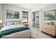 Bright bedroom with stylish decorations and a closet with shelving at 13299 Wildgrass Trl, Odessa, FL 33556