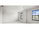 Bright bedroom with a carpet and windows allowing lots of natural light at 13299 Wildgrass Trl, Odessa, FL 33556
