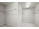 Walk-in closet with wire shelving for optimal organization and storage at 13299 Wildgrass Trl, Odessa, FL 33556