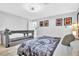 Spacious bedroom featuring a daybed and a view of the kitchen and dining room at 1384 S Hillcrest Ave, Clearwater, FL 33756