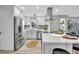 Modern kitchen featuring stainless steel appliances, white cabinets, and a stylish island at 1384 S Hillcrest Ave, Clearwater, FL 33756
