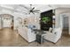 Bright living room with modern fireplace, stylish decor, and comfortable seating for relaxation and entertainment at 14514 Woodland Spur Dr, Lithia, FL 33547