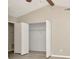 This bedroom features an open closet, light walls, a neutral floor and a high ceiling at 1621 Crossridge Dr, Brandon, FL 33510