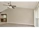 Bright living room featuring new floors, high ceilings, and a ceiling fan at 1621 Crossridge Dr, Brandon, FL 33510