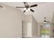 Open floorplan with ceiling fans and access to the backyard through sliding glass doors at 1621 Crossridge Dr, Brandon, FL 33510