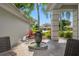 Charming courtyard featuring a decorative water fountain and comfortable seating for relaxing outdoors at 17311 Carriage Way, Odessa, FL 33556