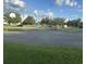 Outdoor basketball court with playground and green space perfect for recreation at 1941 Greenwood Valley Dr, Plant City, FL 33563