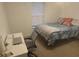 Cozy bedroom with natural lighting and desk, ideal for study or relaxation at 1941 Greenwood Valley Dr, Plant City, FL 33563
