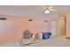 Bonus room offering versatile space, carpeted floors, and neutral decor at 2535 Regal River Rd, Valrico, FL 33596