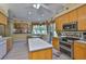 Bright kitchen featuring stainless steel appliances, tile flooring, and an eat-in area at 2535 Regal River Rd, Valrico, FL 33596