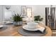 Close-up of a dining table with elegant place settings and decorative plants, perfect for Gathering meals and gatherings at 288 Villa Corte Dr, Lutz, FL 33549