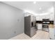 Modern kitchen featuring stainless steel appliances and butcher block countertops at 3114 Lake Pine Way # H2, Tarpon Springs, FL 34688