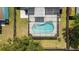 Bird's eye view of the screened pool and patio, seamlessly connecting indoor and outdoor spaces at 3133 Payne St, New Port Richey, FL 34655