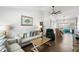 Bright living room with vaulted ceilings, hardwood floors, and stylish furnishings at 3133 Payne St, New Port Richey, FL 34655