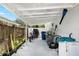 Enclosed patio great for storage and workspace at 3133 Payne St, New Port Richey, FL 34655