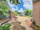 Expansive backyard showcasing lush landscaping and ample space for outdoor activities at 3304 Alamar St, Lutz, FL 33558