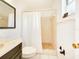 Bathroom features a walk-in shower and a mirror at 3304 Alamar St, Lutz, FL 33558