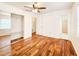 Bedroom featuring hard surface floors and an open closet at 3304 Alamar St, Lutz, FL 33558