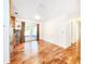 Open-concept dining room with hardwood floors, stylish decor, and an easy flow to the kitchen and patio at 3304 Alamar St, Lutz, FL 33558